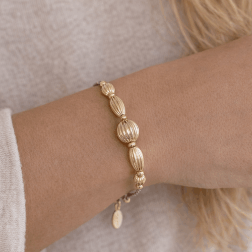 bracelet en cordon et perles striées or collection Portofino - design Mademoiselle Oups