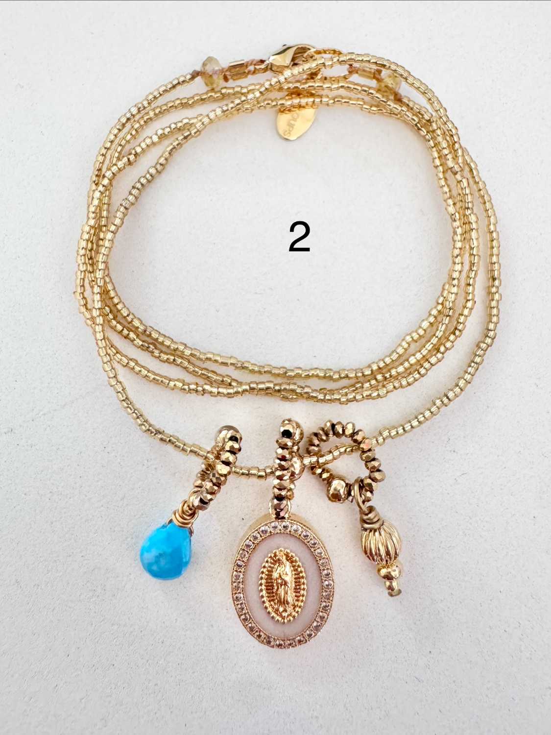 ICON-02-collier-vierge-turquoise Collier ICON 02 Mademoiselle Oups, collier doré avec médaille de la vierge, goutte turquoise et petit charm doré