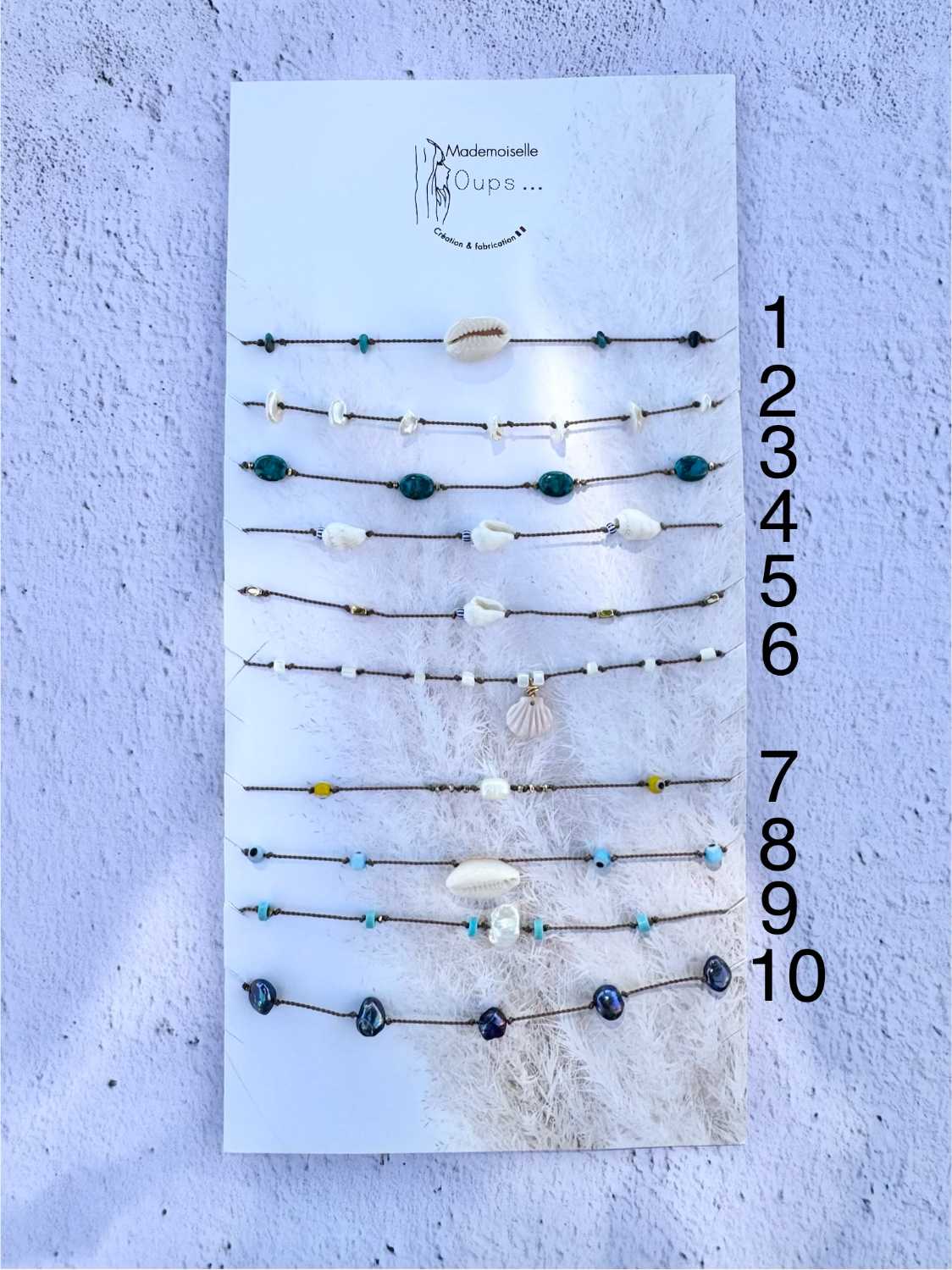 SOUL-AND-SAND-bracelet-cheville-modele-01-a-10-sandstorm-pierres-coquillages-lien-mademoiselle-oups Bracelets de cheville SANDSTORM LIEN NATUREL en coquillages, nacre, turquoise, perles naturelles et pierres fines. Bijoux bohèmes artisanaux fabriqués en France par Mademoiselle Oups.